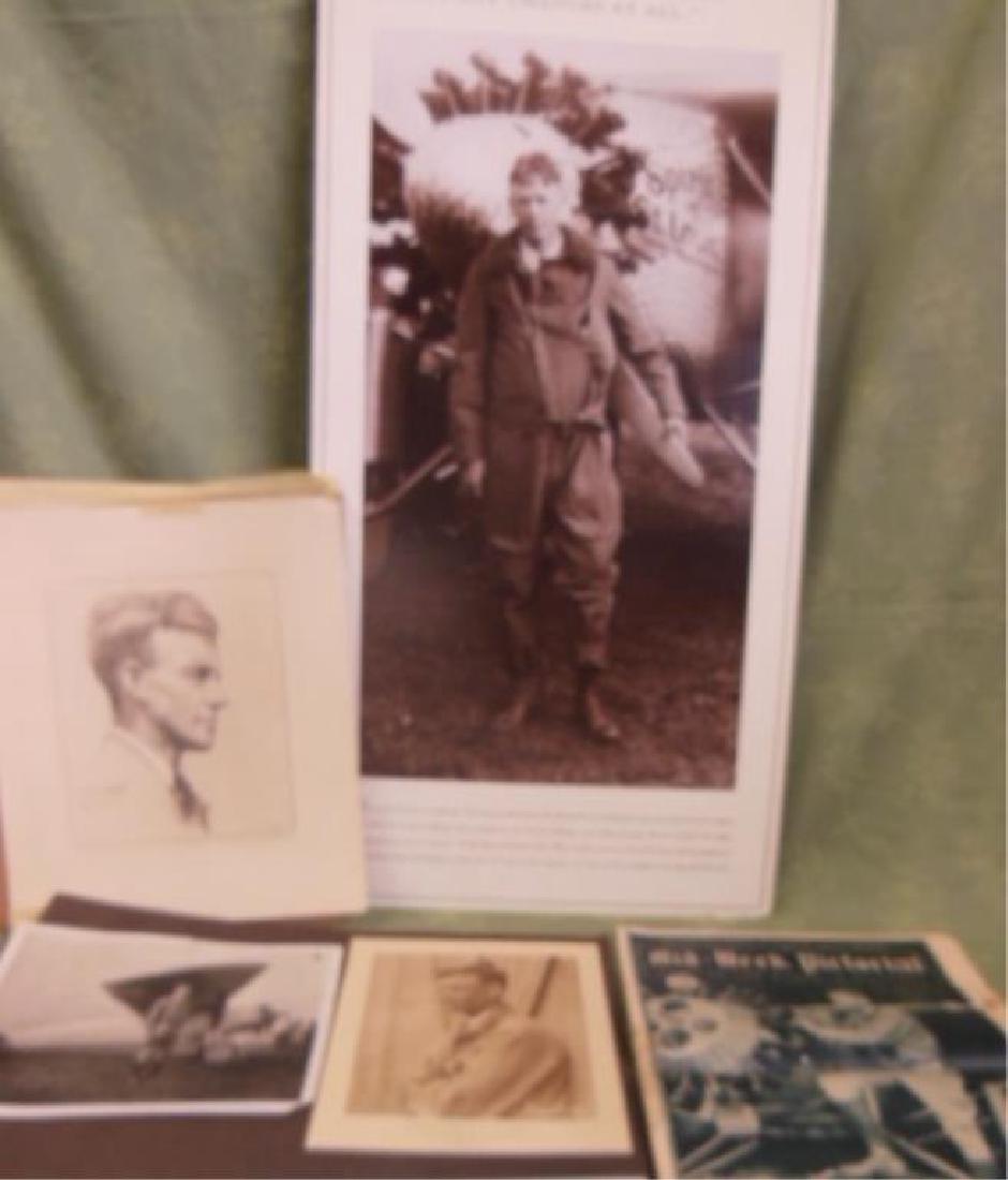Charles Lindbergh Photo & Other Items: Charles Lindbergh Photo & Other Items including: three posters ( two are rolled), 1927 mid week pictorial, 8" x 10' black and white (with Spirit of St. Louis) magazines pages. CONDITION: Newspaper has