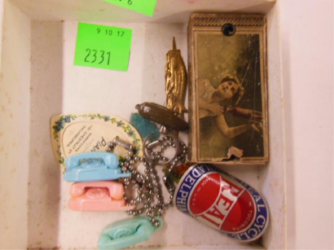 Vintage Advertising Items: Vintage Advertising Items including: three Princess phone keychains, Benson's eye glasses keychain, Heinz Pickle pin, Spermo lubricant pin, Cunningham Piano bookmark, Real Cycle Co bike emblem, Roche