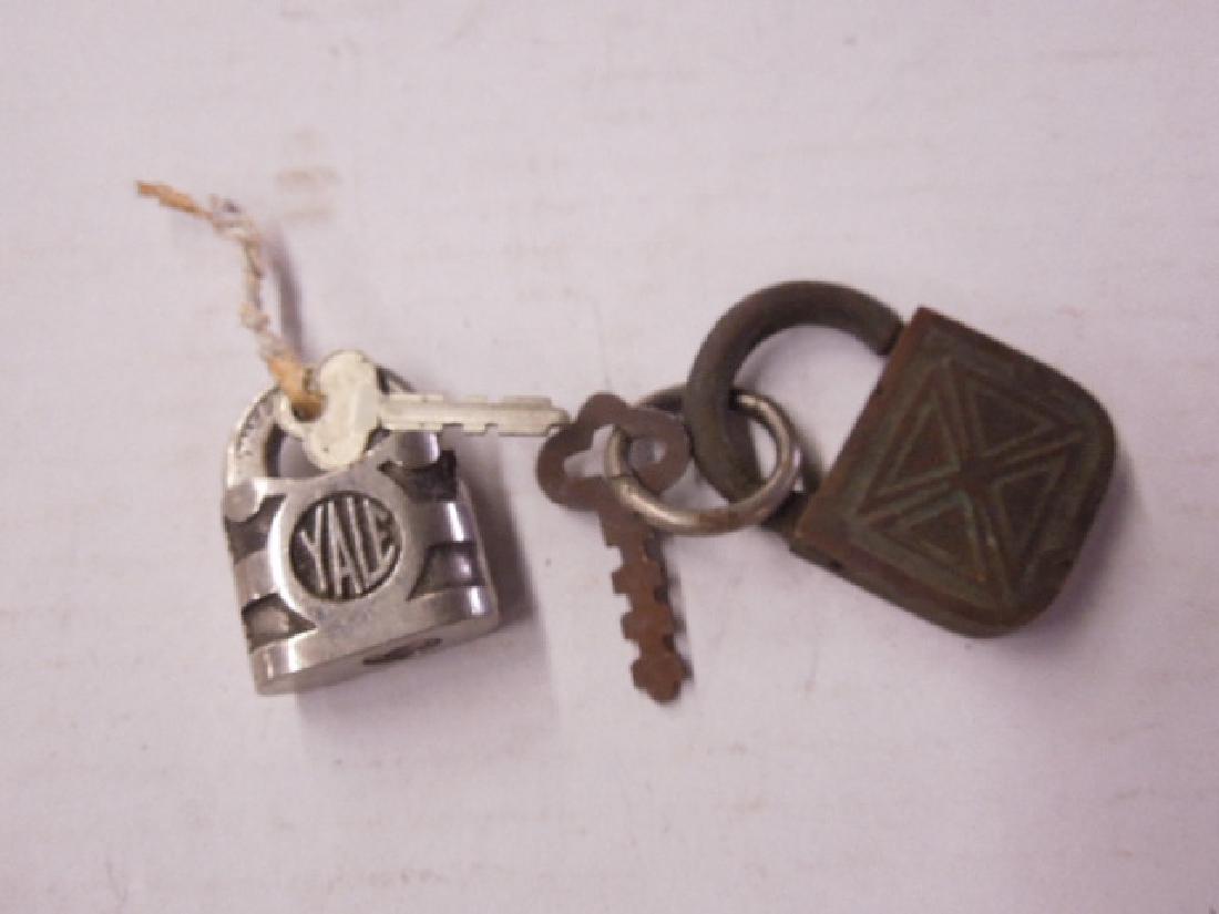 2 Small Vintage Locks w/Keys: 2 Small Vintage Locks with Keys including: one Red Ross, 1 1/4" x 2" lock, plus one Yale and Towne, 1 1/8" x 1 3/8', Stanford, Conn, both with keys, keys open locks. CONDITION: Red Ross lock has surfa
