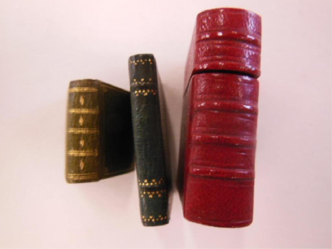 19th C. Miniature Religious Books: Lot of two assorted 19th C. miniature leather bound religious books, includes: 1835 "Small Rain Urn The Tender Herb. Deut XXXii. 2.", Philadelphia: American S. School Union and undated "The Widow's On