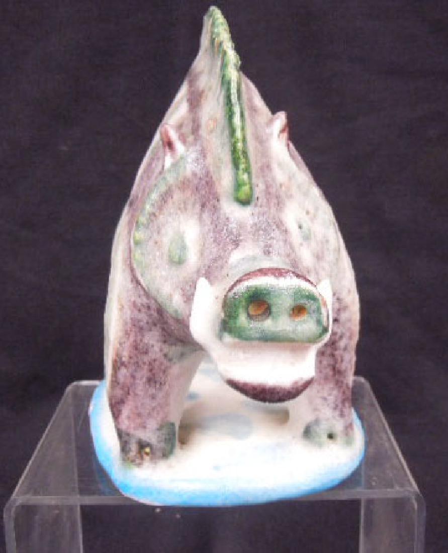 Guido Gambone Pottery Warthog Figure: Circa 1950s-1960s Guido Gambone designed for Raymor, hand painted Italian pottery 6" (h) x 6 3/4" (l) x 3 1/2" (w) Warthog figure, original Raymor paper label on base. CONDITION: Areas with glaze impe