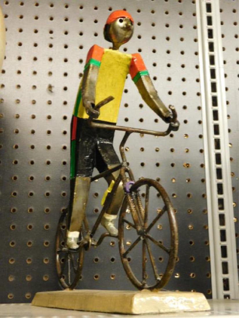 Luis Felguerez Signed Sculpture: [Luis] Felguerez signed 13" (h) x 12 1/2" (l) papier mache and metal bicyclist sculpture. CONDITION: Areas with wear.
