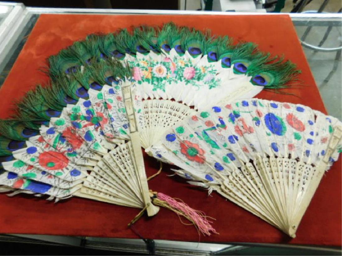 Chinese Peacock Feather Hand Fans: Lot of 3 assorted antique Chinese carved bone & hand painted peacock feather ladies hand fans, includes: 8 1/2"L with15"L fan mount, 12 1/2"L wit 21 1/2"L fan mount & 13"L with 22"L fan mount. CONDITI