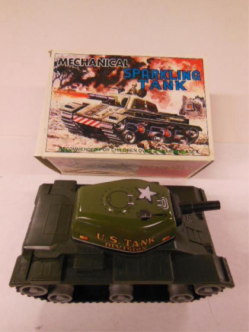 Vintage Marx Tin Key Wind Tank: Vintage Marx Tin Key Wind Tank, in original box, U.S.Tank Division, J-5439 tin litho sides and gun turret, mechanical, sparkling tank, key wind side, 7 1/2" (#90). CONDITION: Minor wear to tin litho, 