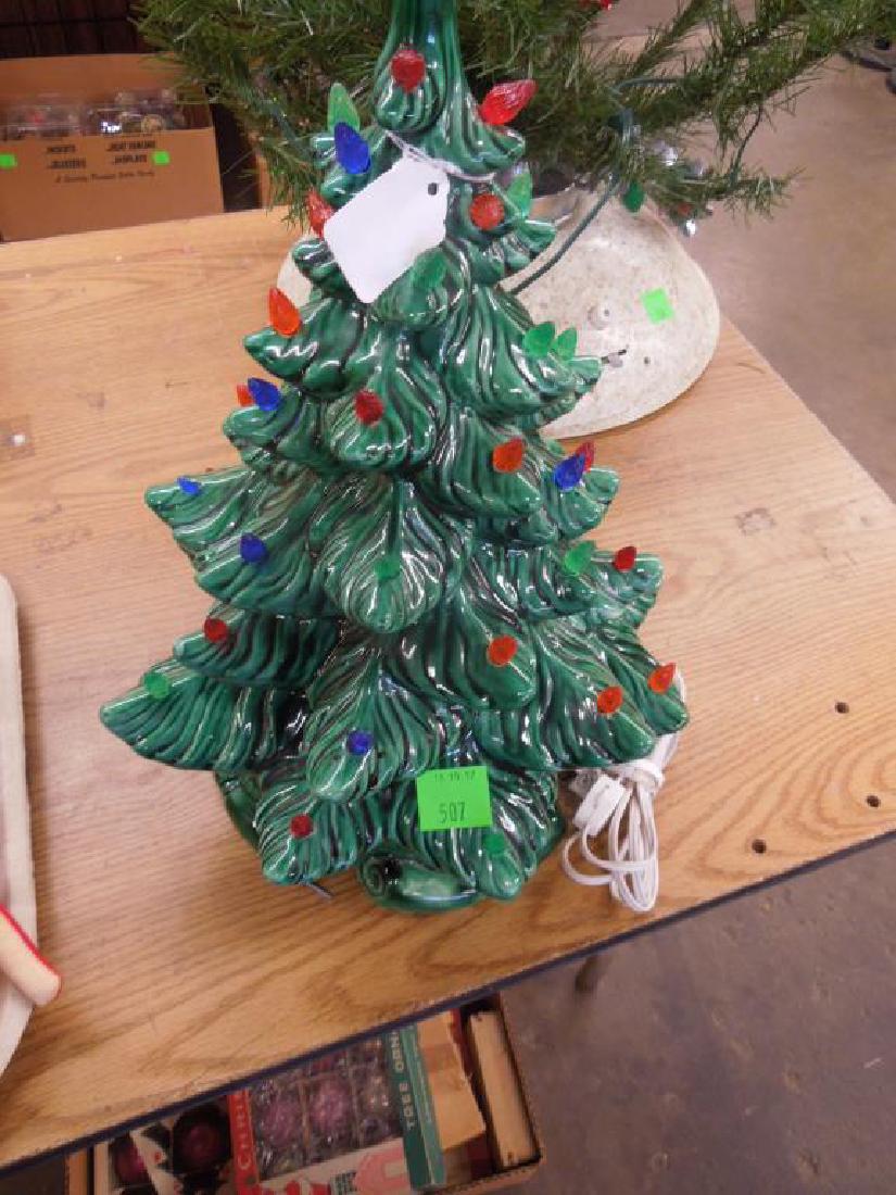 Vintage Porcelain Christmas Tree: Vintage Porcelain Christmas Tree, 17", on stand with red, green and blue plastic lights (all there), electric card lights tree. CONDITION: Minor wear.