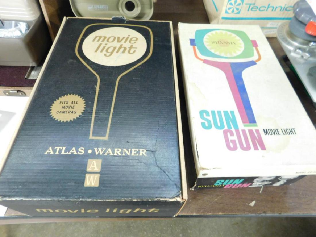 3 Vintage Movie Lights: 3 Vintage Movie Lights, both in original boxes including: Sylvania "Sun Gun" with instruction booklet and camera mounting bar, 10" and (two in one box) Atlas Warner, model 1210 with pamphlet and two c