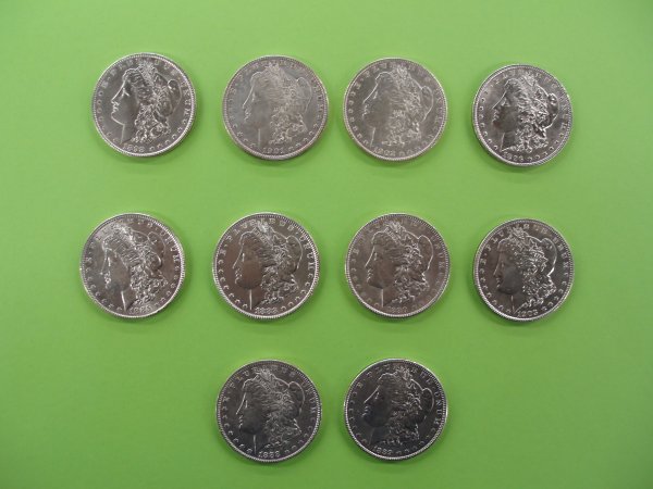 10 unc. Morgan silver dollars