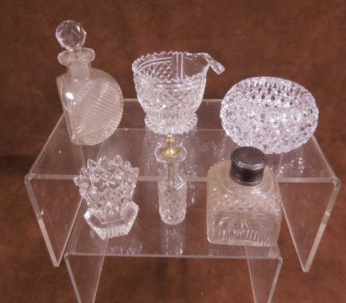 6 Pc Cut Glass Table Accessories: Six piece Cut Glass Table Accessories, American and English includes: 3" English sterling silver hall marked perfume bottle, 3 1/4" toothpick, 3"h x 4 1/4" d, tab handle sugar bowl, 3 1/4"d x 2 1/4" m
