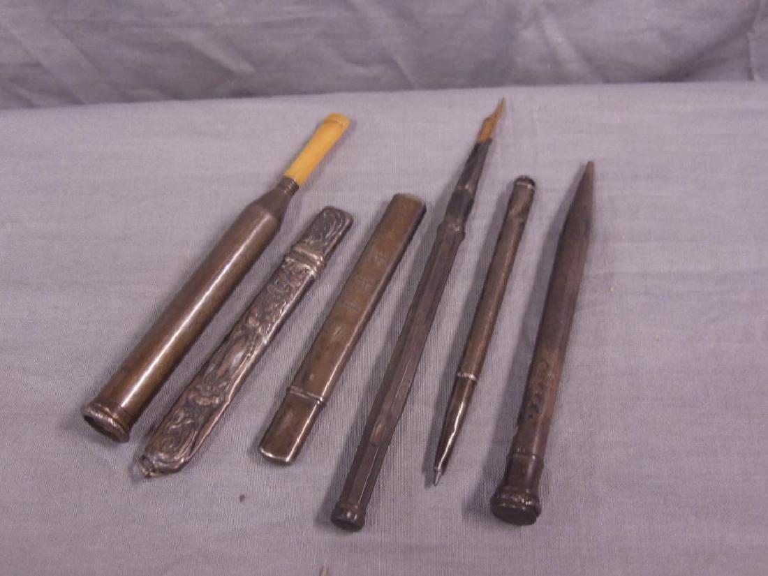 Sterling Pencils & Cigarette Holder: Sterling Pencils & Cigarette Holder, six pieces includes: two adjustable pencils, one pen, one floral repousse pencil in case and one in plane case, late 19th to early 20th C, one extendable cigarette