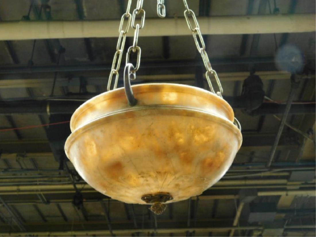 Classical Alabaster Hanging Planter: Classical Alabaster Hanging Planter, scroll carved bottom with brass finial, brass handling hooks and chain, 19th C, planter 13" d, 8"h. CONDITION: Good, modest wear.