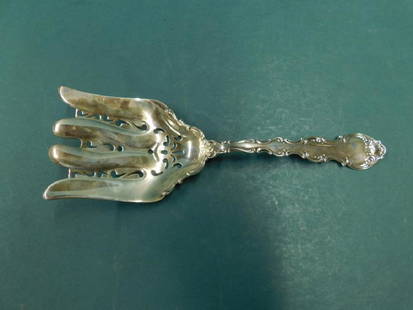 Antique Gorham Sterling Asparagus Serving Fork: Antique Gorham Sterling Asparagus Serving Fork in the Strasbourg pattern, 9" long, Hallmarked with the Gorham lion / anchor / G mark, retailed by Simons Brothers & Co. no monogrammed, total weight 6.6