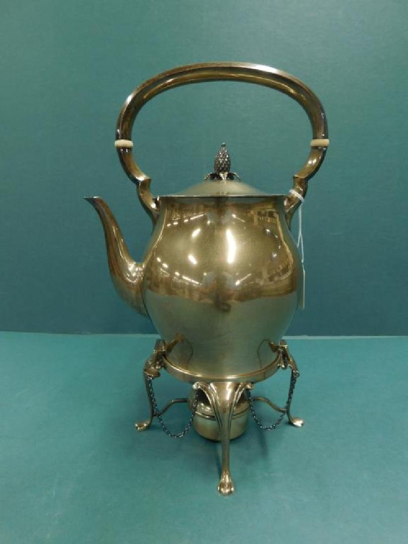 Tuttle Silversmiths Sterling Kettle on Stand: Tuttle Silversmiths Sterling Kettle on Stand,a sterling silver teapot - form hot water kettle in the Paul Revere pattern by Tuttle Silversmiths, Boston, dated 1945, hallmarked with the Tuttle pine tre