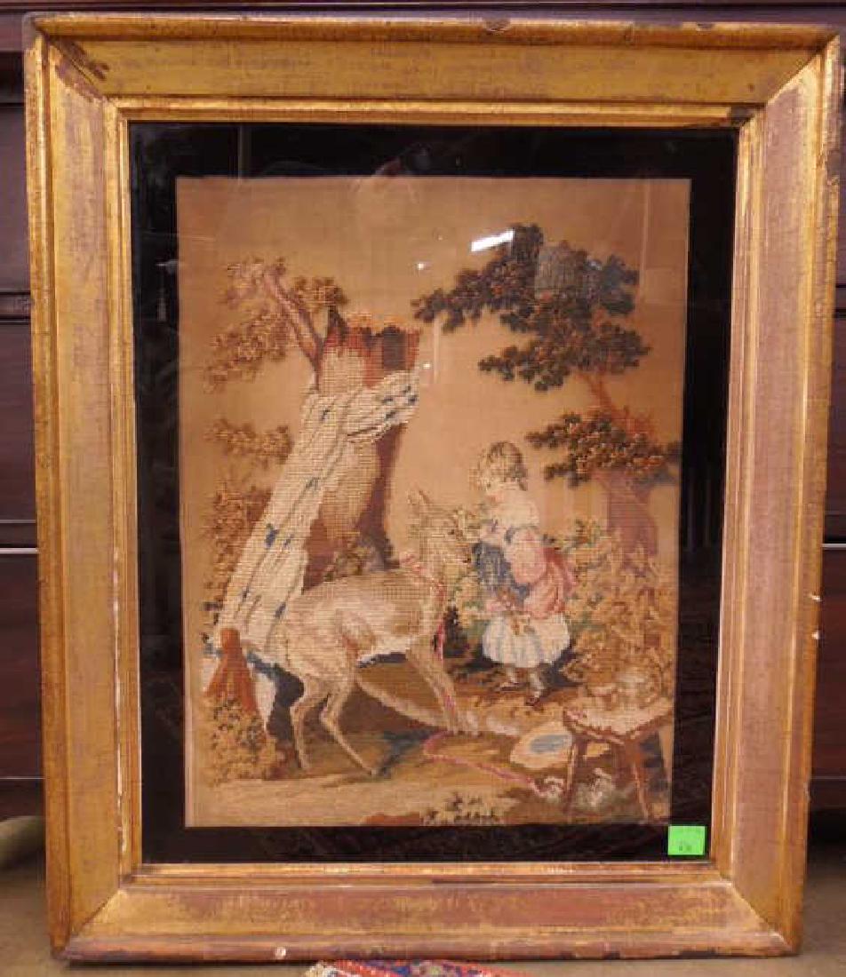 19th century panel needlepoint: 19th century panel needlepoint, depicts a young girl in garden setting; black bordered glass front in gilt wood frame; 25" x 29 3/4". CONDITION: Areas of foxing, wear and chips to gilt frame.