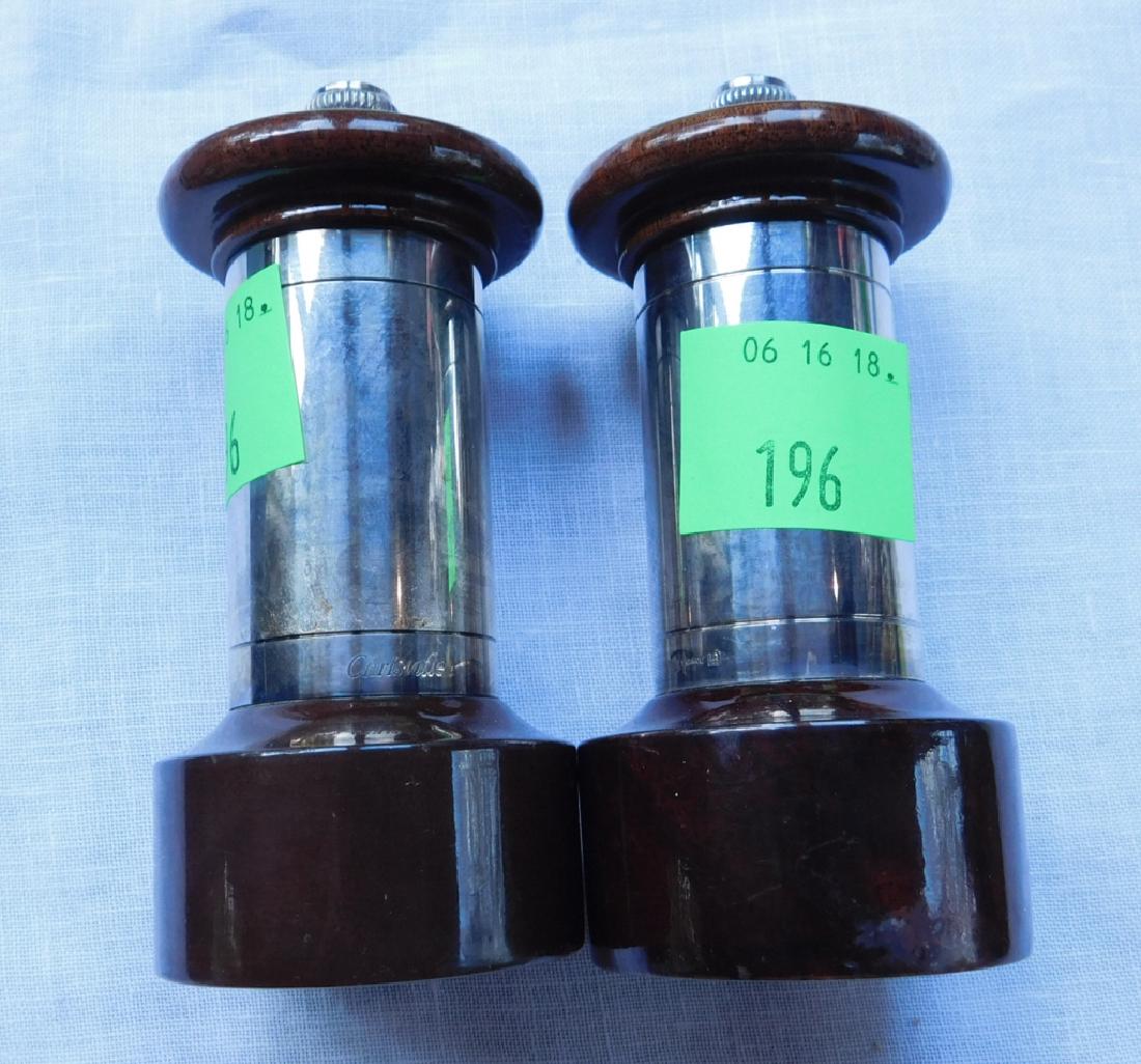 Pair Christofle Pepper Mills #2: Pair Christofle Pepper Mills in silver plate and wood. Both boxed. Marked Christofle Made in France. 4 1/2" h