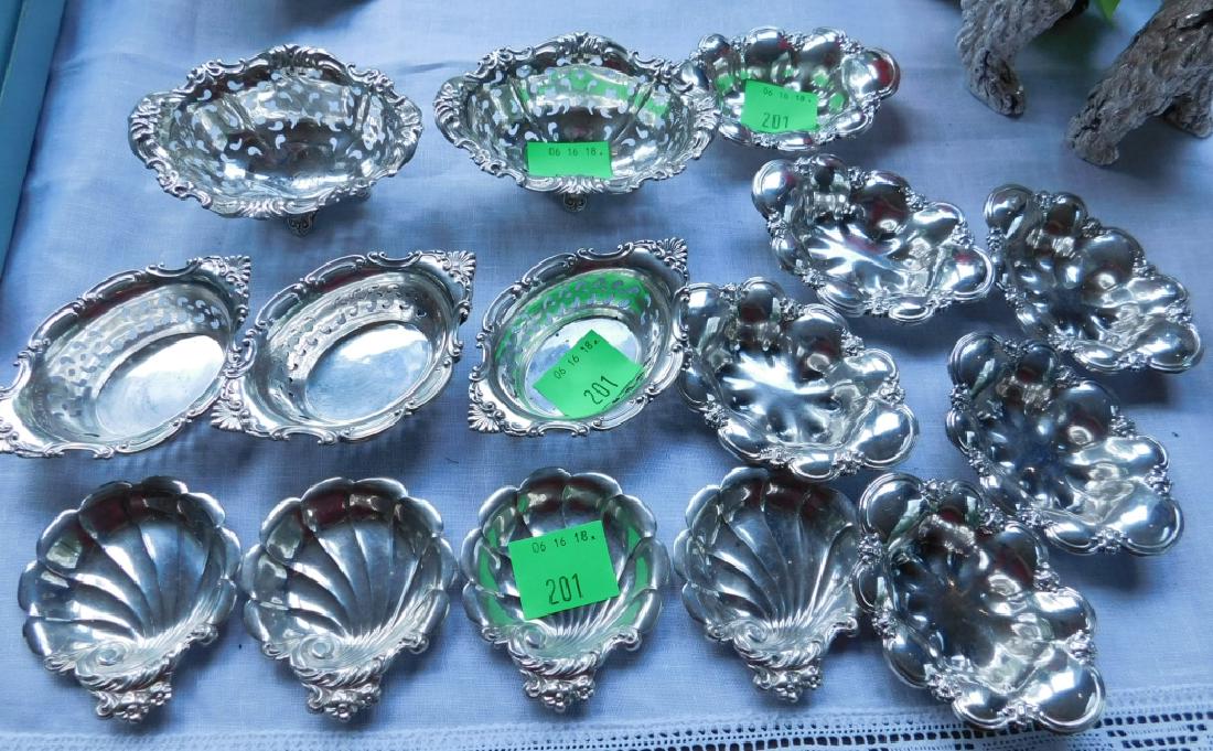 Sixteen Assorted Sterling Nut Dishes (1 of 4)