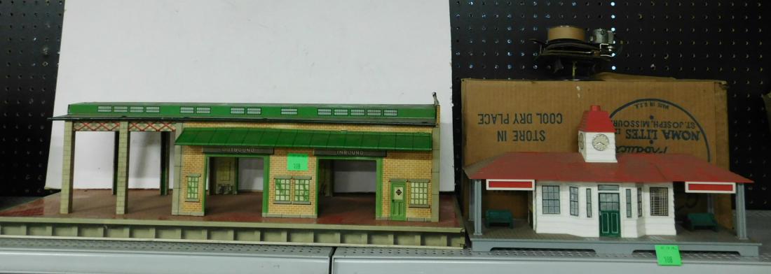 2 Vintage Train Stations: Two Vintage Train Stations including: Marx tin litho Freight Terminal,10 3/4" x 28 5/8" x 9"h and Noma plastic "electronic" announcing railroad station with original box, 6" x 16" x 8"h, untested. CON