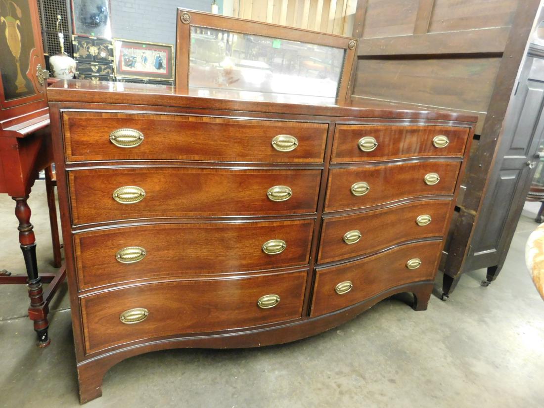 Hepplewhite Style Double Dresser: Hepplewhite Style Double Dresser, bonded mahogany, serpentine front, rectangular 311/4" x 45 1/2" mirror with rosette corners, mid 20th C. dresser 36" x 22" x 35". [5055] CONDITION: Minor scratches an