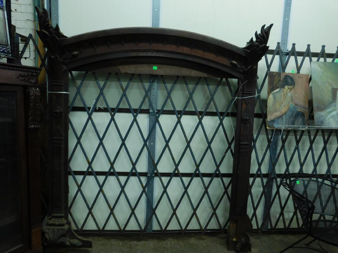 Renaissance Revival Overmantle Frame: Renaissance revival overmantle frame, walnut, arched crest, elaborate acanthus, bird, and medallion carvings, late 19th c. approx 78"h, 68"L. CONDITION: Areas of carvings broken and or missing, base o