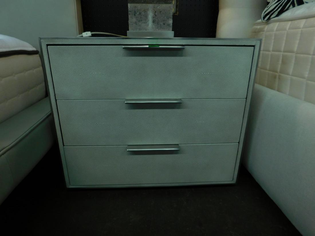 Pr Restoration Hardware Shagreen Covered End Tables: Pair Shagreen-Covered End Tables, off white, faux Shagreen pattern coverings with aluminum edge trim and bar handles, three drawers, 21st C, 20" x 26" x 22 1/4". CONDITION: Very good, light wear. Made