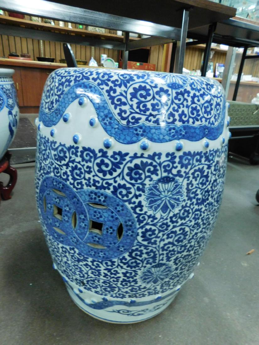 Antique Chinese Garden Seat: Antique Chinese Garden Seat, blue and white porcelain, barrel form open work ringed top and double ring sides, overall blue floral and scrolls, raised buttons, swirl borders, 19th C, approx. 19 1/2"h,