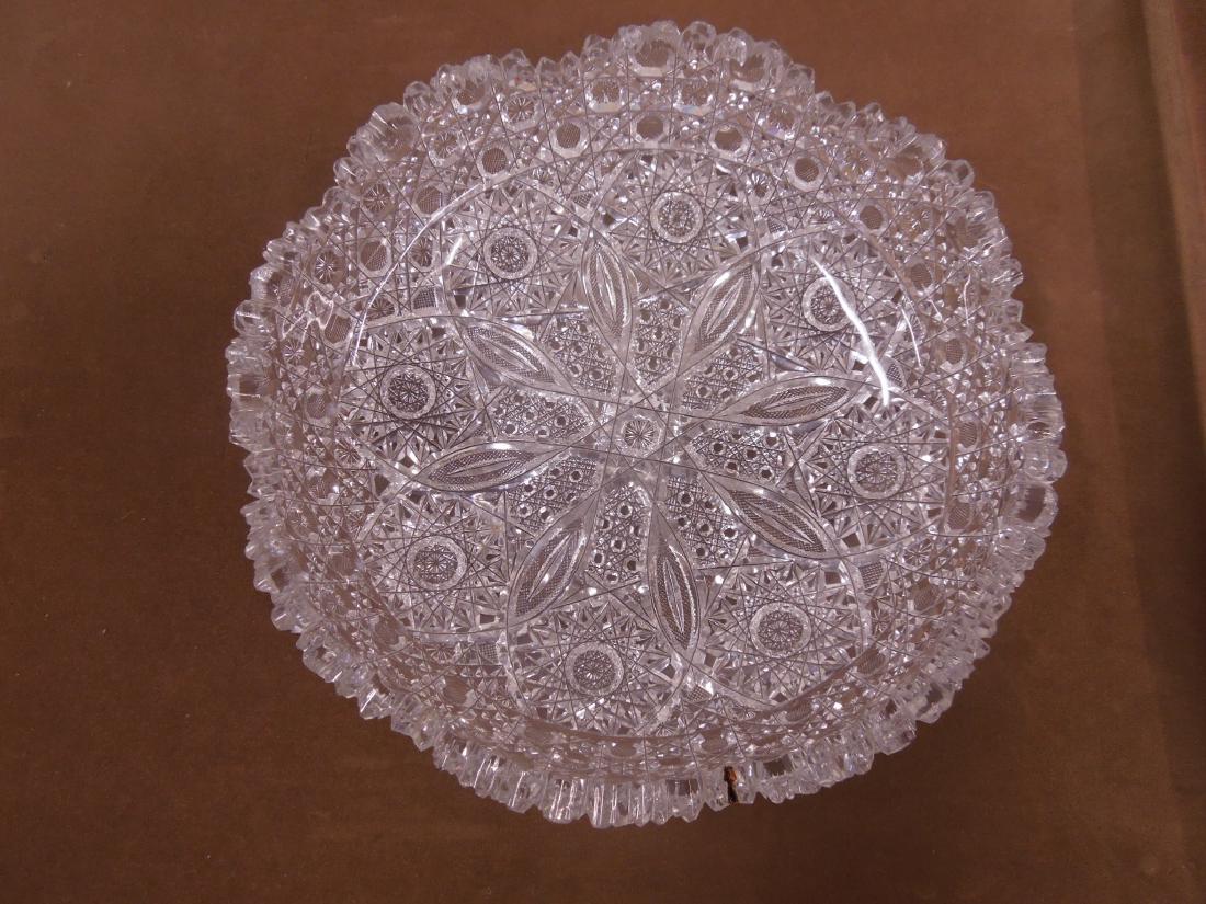 Brilliant Cut Glass Bowl: Brilliant Cut Glass Bowl, Hobstar, loop and daisy in button cuttings, late 19th C, 9 1/8"d, 2 1/2"h. CONDITION: Exceedingly, minor rim flakes.