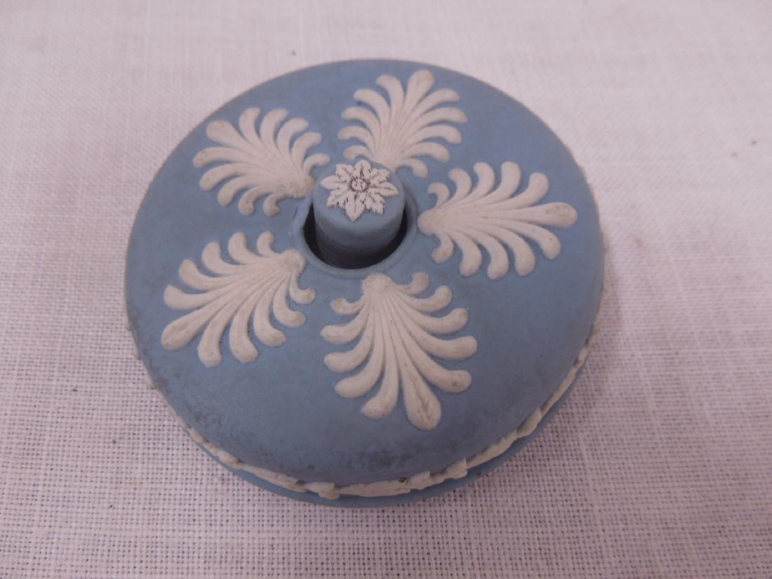 Wedgewood Doorbell: Wedgewood Doorbell, pale blue jasperware with white foliate motifs, marked "England Wedgwood", early 20th C, 2 7/8"d. CONDITION: Includes: electrical hook-up in back, small chip on inner rim at push b
