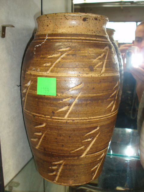 Signed contemporary art pottery vase: Jane Maxwell signed contemporary art pottery 11 1/2" vase, tan & brown glaze w/incised abstract design