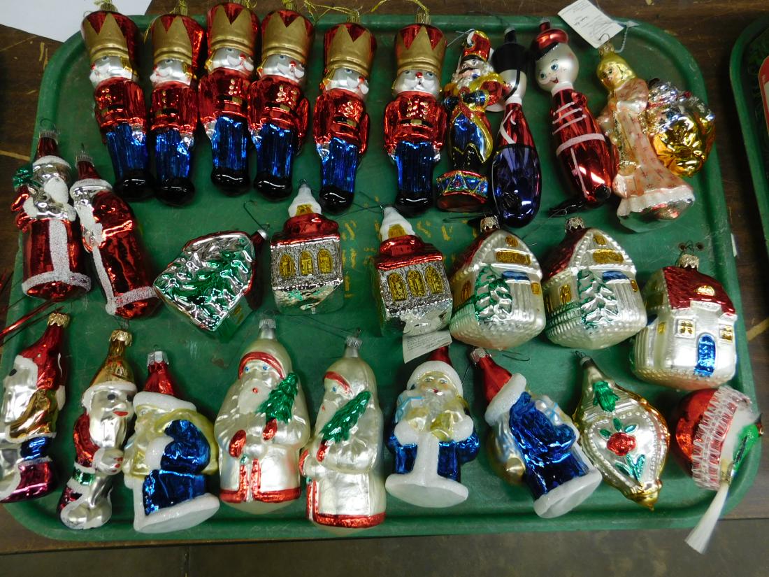 28 Figural Glass Christmas Ornaments: 28 figural glass Christmas ornaments including; Santas, houses, nutcracker, Angel, bird in nest, all with top hook holders. Condition; tops of some ornaments may have very minor loss under or around c
