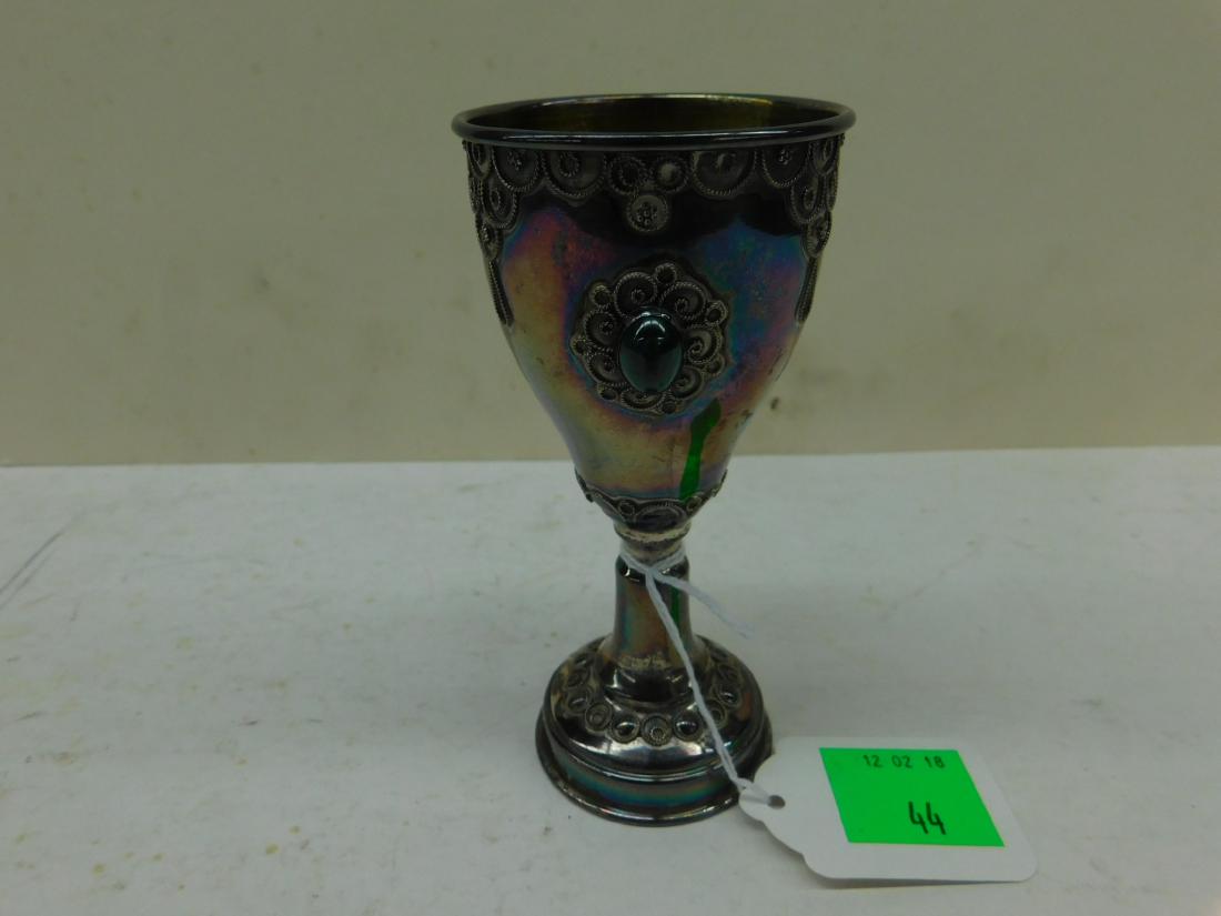 Sterling Kiddush Cup With Malachite: Sterling Kiddush Cup With Malachite 5 1/4" filigree scroll work and polished cabochon oval malachite. [66] CONDITION: Tarnished, very good condition.
