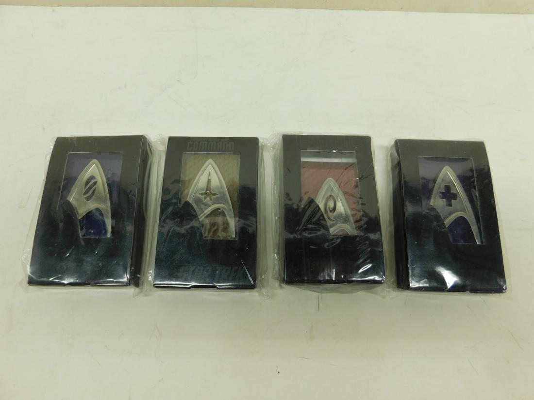 4 Star Trek Division Insignia Badge: 4 Star Trek Division Insignia Badge, all still in boxes and plastic, like new including: Command, Science Medical and Cadet, brushed pewter finish. CONDITION: No issues.
