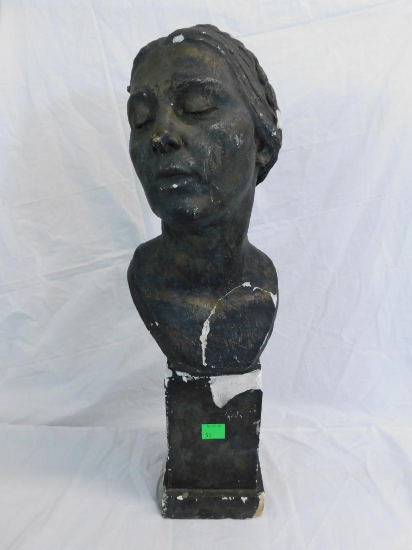 Albert Laessle Bust of a Young Woman: Albert Laessle Bust of a Young Woman: A plaster bust of a young woman with plaited hair and downcast eyes, standing on a talle rectangular plinth. Both pieces painted/patinated brown to resemble bronz