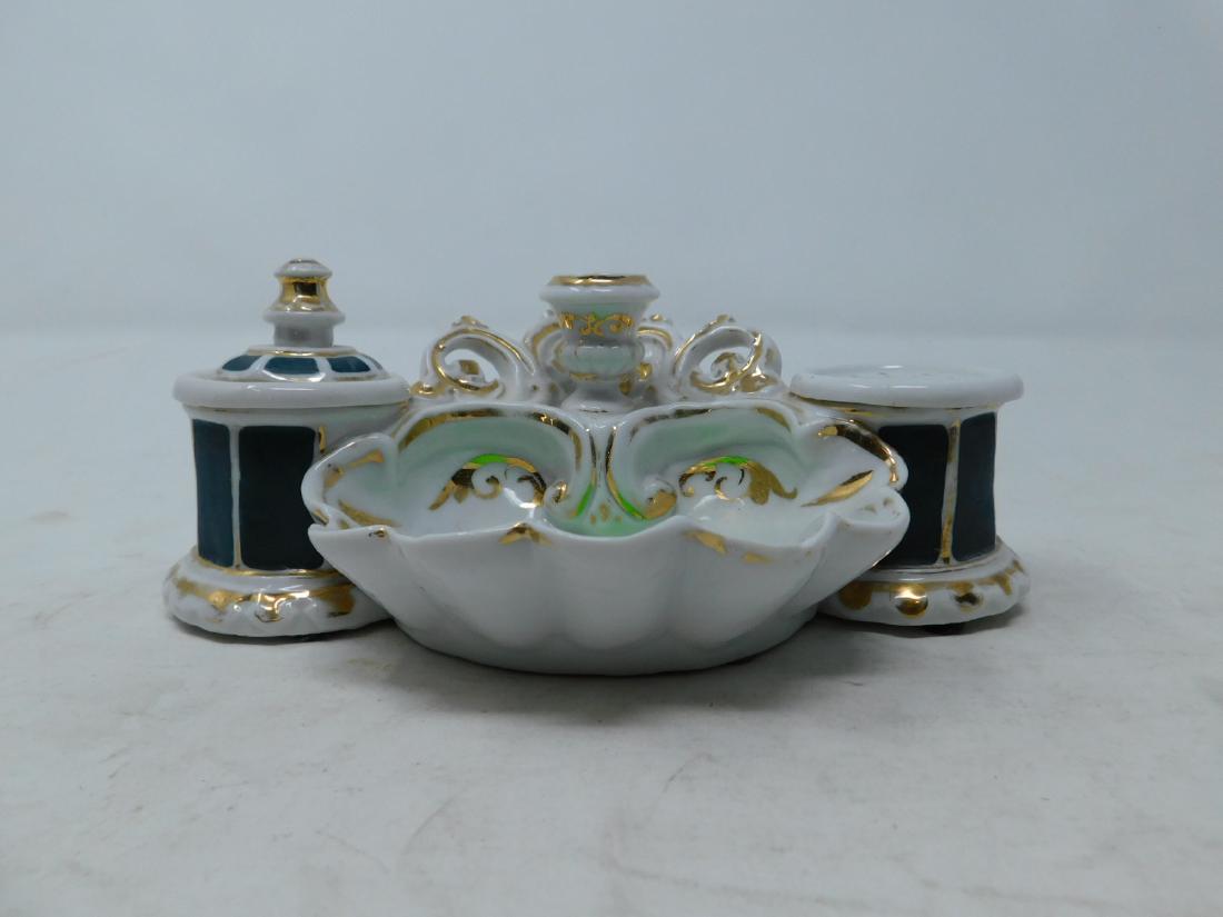 Vieux Pairs Porcelain Inkwell: Vieux Pairs Porcelain Inkwell: Old Paris porcelain inkwell, in the Rococo Revival style, with central scallop shell tray and candleholder. Flanked by cylindrical ink pot and sander holder, which are g