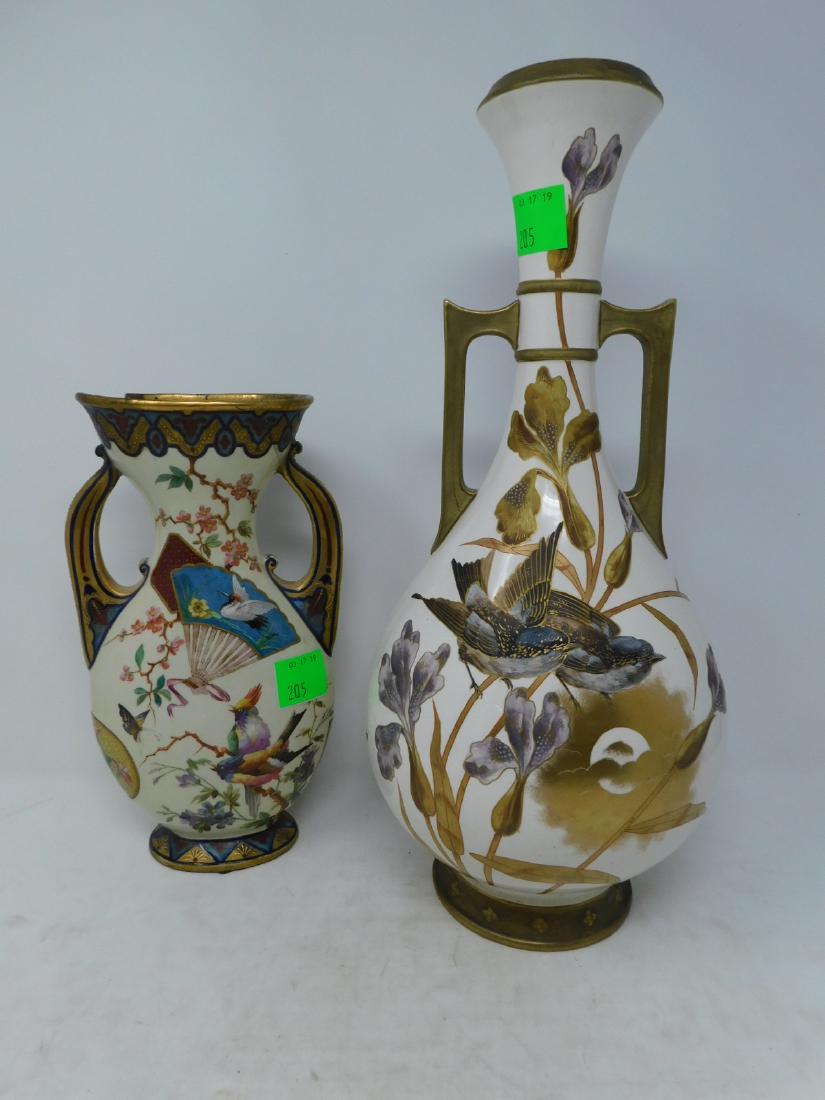 Two Aesthetic Period Earthenware Vases: Two Aesthetic Period Earthenware Vases: Conisting of a large handled, bottle-form example decorated with hand-painted birds, irises and a dragonfly in gilt and raised goldd deocration and a small faie