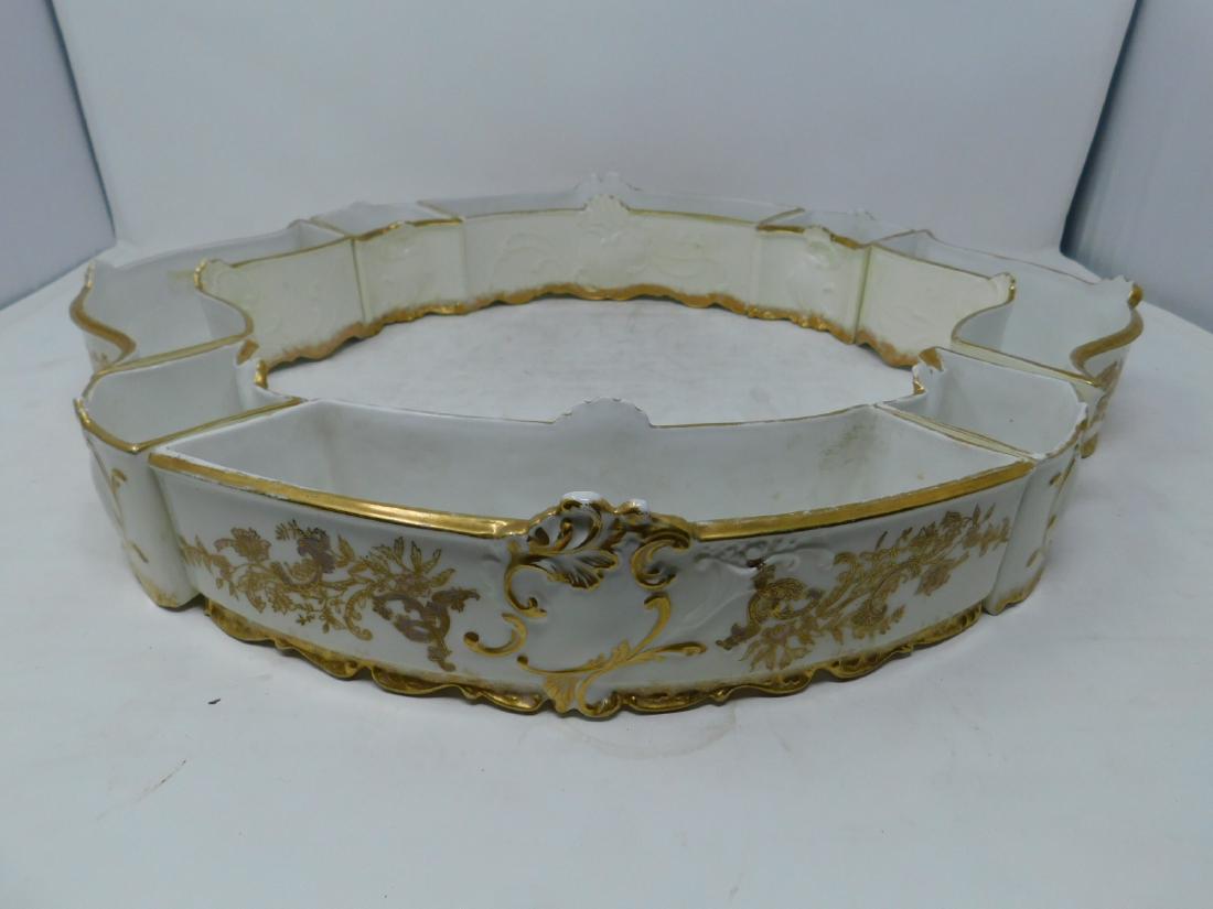 Antique Limoges Porcelain Centerpiece: [8 items] Antique Limoges Porcelain Centerpiece : An eight piece Limoges porcealin posy ring centerpiece in the Rococo Revival style. Cream-colored ground with complex gold decoration. Marked Limoges 
