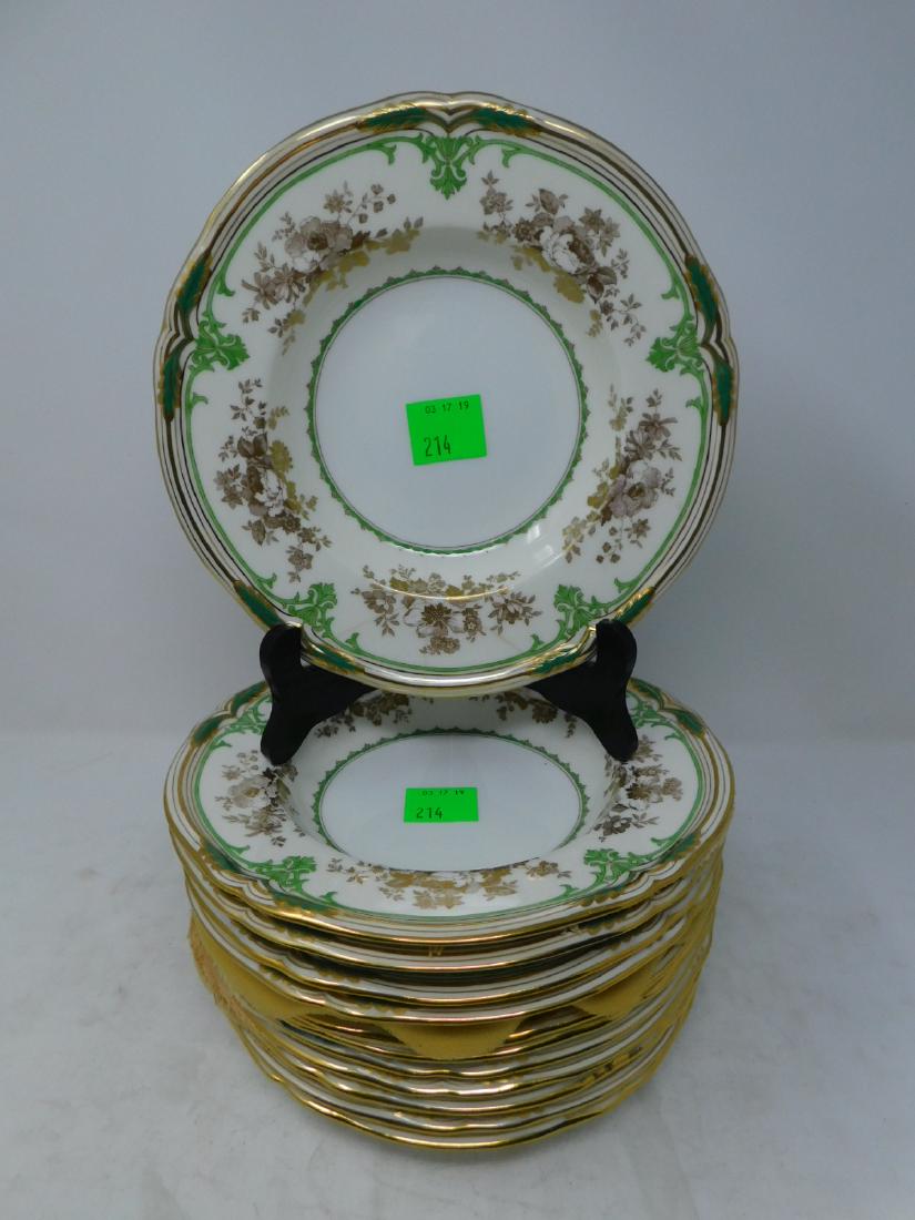 Minton's for Tiffany & Co Porcelain Soup Bowls: [12 items] Minton's for Tiffany & Co Porcelain Soup Bowls: Set of twelve. White porcelain body with Rennaisance Revival style decoration in green enamel and gold. Marked Minton's for Tiffany & Co on r