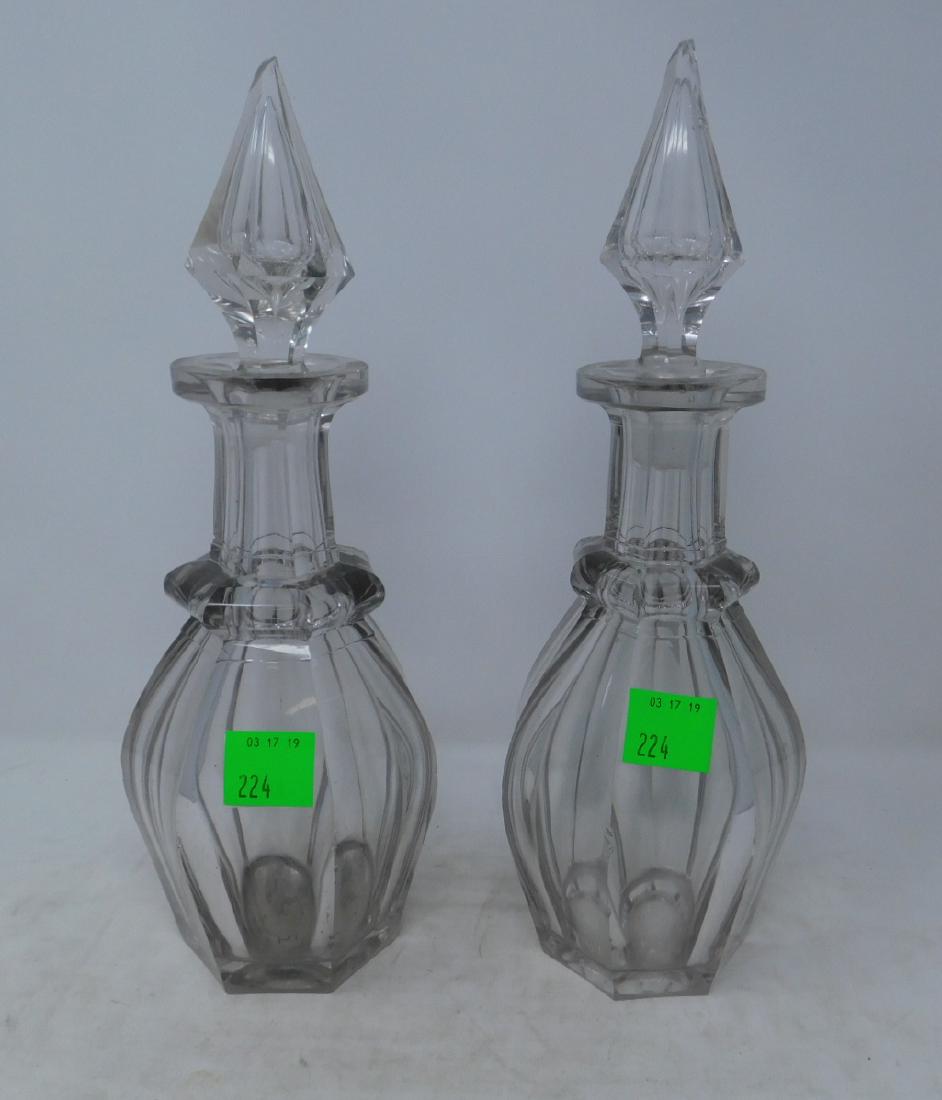 Pair Large Flint Glass Decanters: Pair Large Flint Glass Decanters : Panel cut with cut collars, airtrap spear-point stoppers. Anglo-Iriish or American, maybe Pennsylvania. Early 19th century. Stoppers may be replacements. Provenance: