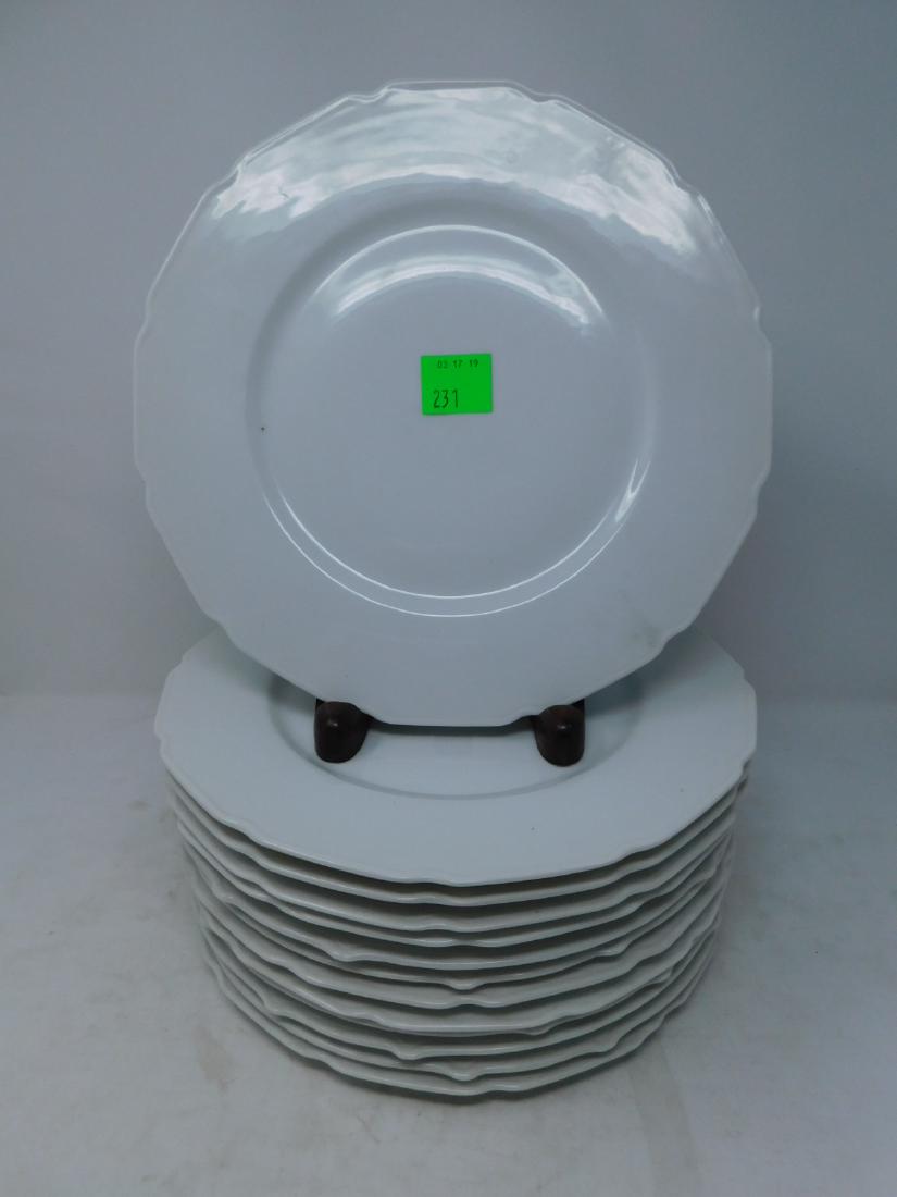 T&V Limoges White Porcelain Dinner Plates: [13 items] T&V Limoges White Porcelain Dinner Plates: Set of thirteen. Antique white porcelain T&V Limoges scalloped-edge dinner plates or chargers, likely sold as whiteware to be decorated by hobbyis