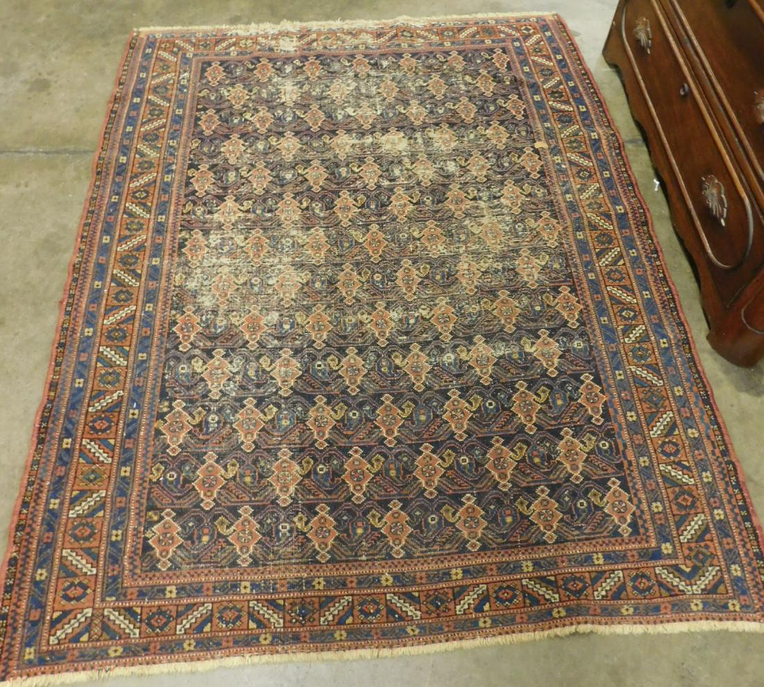 Antique Kazak Throw Rug: Antique Kazak Throw Rug, cobalt ground with rust, beiges and blues geometric field and borders, early 20th C, 4.3' x 5.4'. CONDITION: Heavy wear.