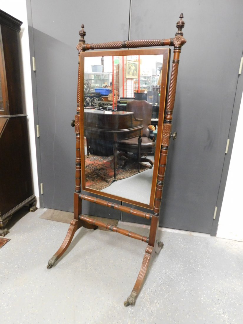 Federal Style Cheval Mirror: Federal Style Cheval Mirror, mahogany, two tone spiral turned frame with rosette and foliate carvings and urn finials support a maple string inlaid edge mahogany mirror frame with embossed brass adjus