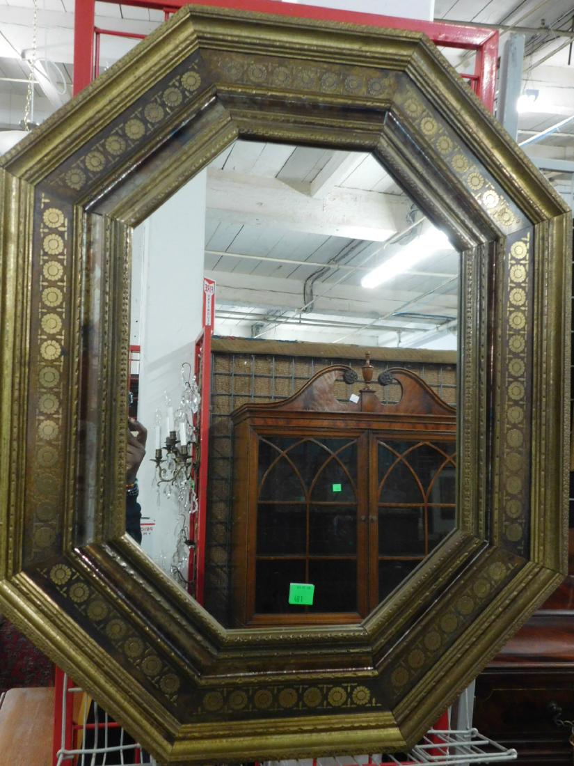 Boulle & Brass Wall Mirror: Boulle and Brass Wall Mirror, octagonal form, antiqued molded brass covered frame with rosette boulle wide band and raised distressed mirror, inner frame, 20th C, 32" x 39". CONDITION: Slight bend of 