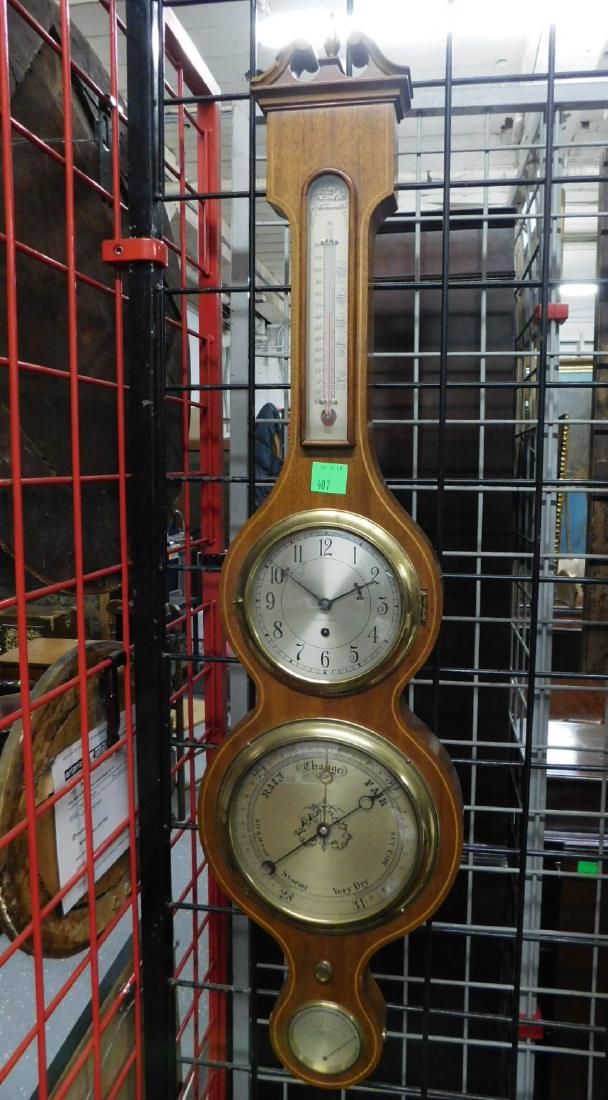 Chelsea Banjo Barometer / Clock: Chelsea Banjo Barometer / Clock, mahogany with line inlay, brass framing and finial, silvered dials, time only, key wind clock movement, mid 20th C. CONDITION: Left scroll of swan's neck pediment has 