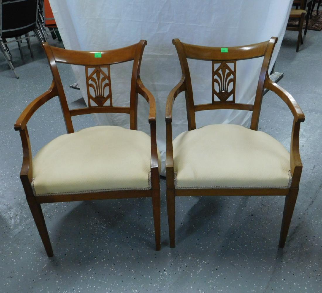 Pr Biedermeier Arm Chairs: Pair Biedermeier Arm Chairs, fruitwood, curved crest rail over a rectangular panel with cut out plumes, shaped open arms yellow cloth upholstered seats, tapered square legs, 19th C, Austria or Germany