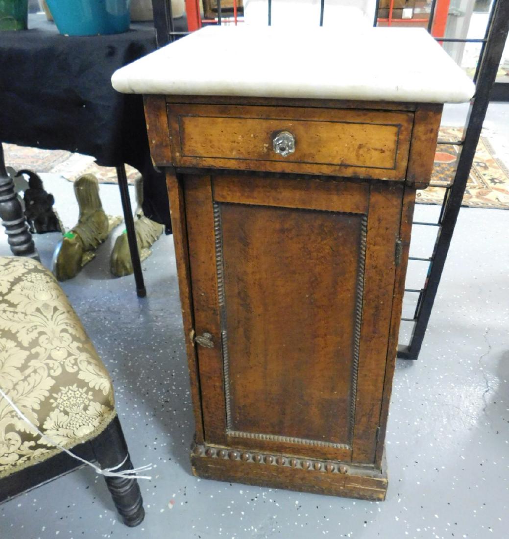 Classical Commode / Stand: Classical Commode / Stand, maple with bird's eye and tiger with string inlays, white marble top over single drawer with glass pull and recessed paneled door with beading; bead crested plinth base; tra