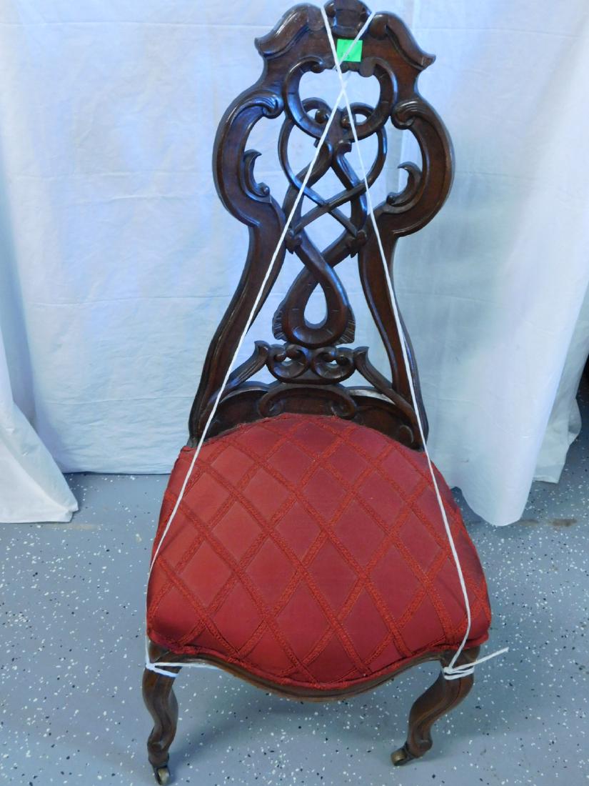 Belter Type Lady's Chair: Belter Type Lady's Chair, Rococo Revival style, laminated walnut, shaped, narrow high back with carved scrolls and loops, red cloth upholstered seat with shaped apron and cabriole legs on casters, 185