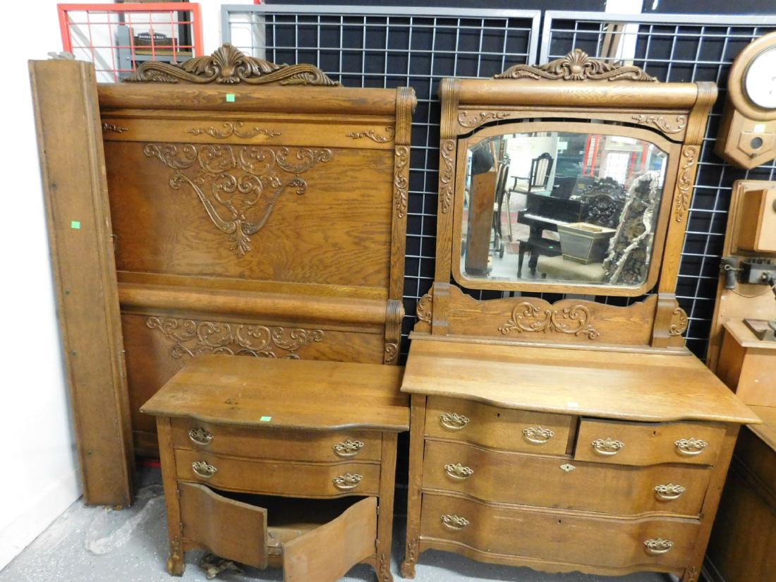 3 Pc Oak Bedroom Set: Three Piece Oak Bedroom Set, golden oak, featuring applied scrolls and fans, rolling pin crests, pierced brass hardware, includes: full size bed, 79"h, serpentine front bureau with swivel mirror, and