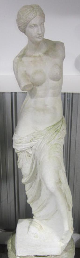 Vintage Venus de Milo Concrete Statue: Vintage Venus de Milo Concrete Statue on square base, 41 1/2"h. CONDITION: Minor weather wear with some grass or moss staining.