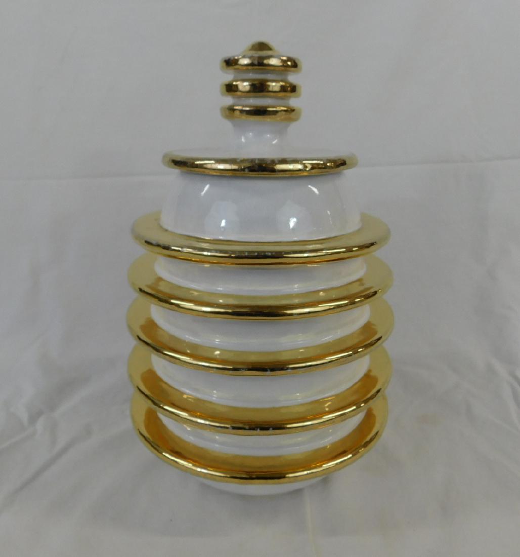 Bitossi Italian Pottery Lidded Jar: Bitossi Italian Pottery Lidded Jar. Hand-thrown, with a series of wide rings or horizontal ribs, in the MCM style. Glazed white, the rings gilded. Marked "Italy 95/518", made by Bitossi for Goodfriend
