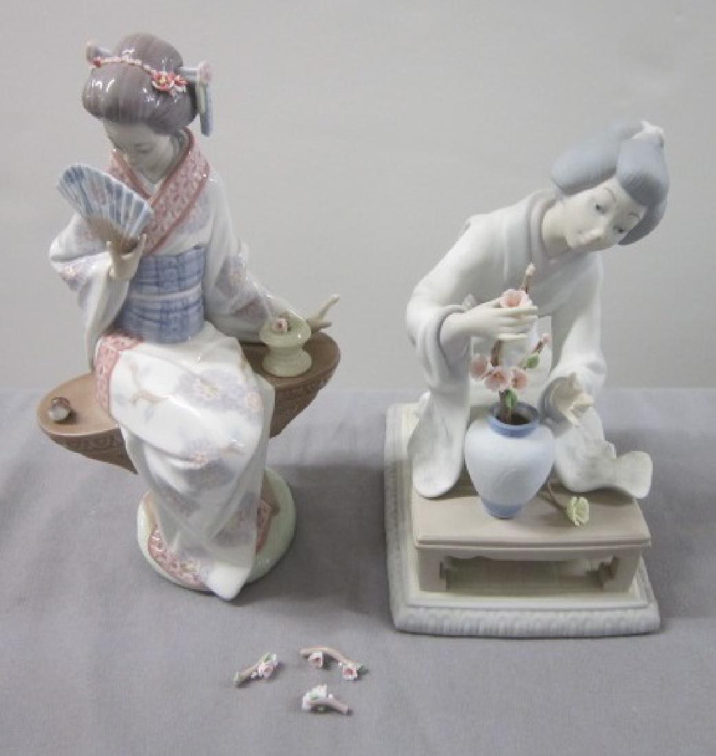 Two Lladro Porcelain Figurines: Two Lladro Porcelain Figurines, Japanese Women including: Japanese Woman Arranging Flowers, #4840, matte finish, retired, 4 1/2" x 6" x 8 1/4"h, plus Nippon Lady, #5327, retired, 9"h. CONDITION: Three