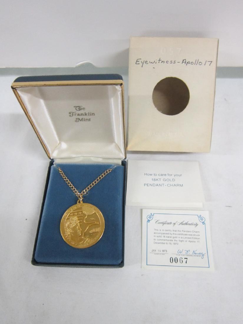 18k Gold Apollo 17 Pendant Charm: 18k Gold Apollo 17 Pendant Charm; 1/2 oz 18k gold charm made by Franklin Mint with certificate of authenticity in original box. CONDITION: No issues identified.