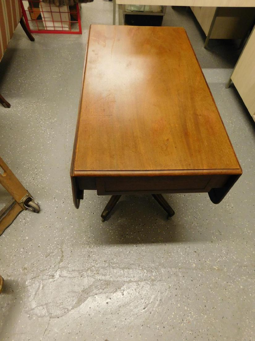 Antique Duncan Phyfe Style Drop Leaf Table: Antique Duncan Phyfe Style Drop Leaf Table,mahogany, molded edge single board top and rounded corner drop leaves, single drawer in the paneled frieze, toned pedestal, four sabre legs with brass laps a